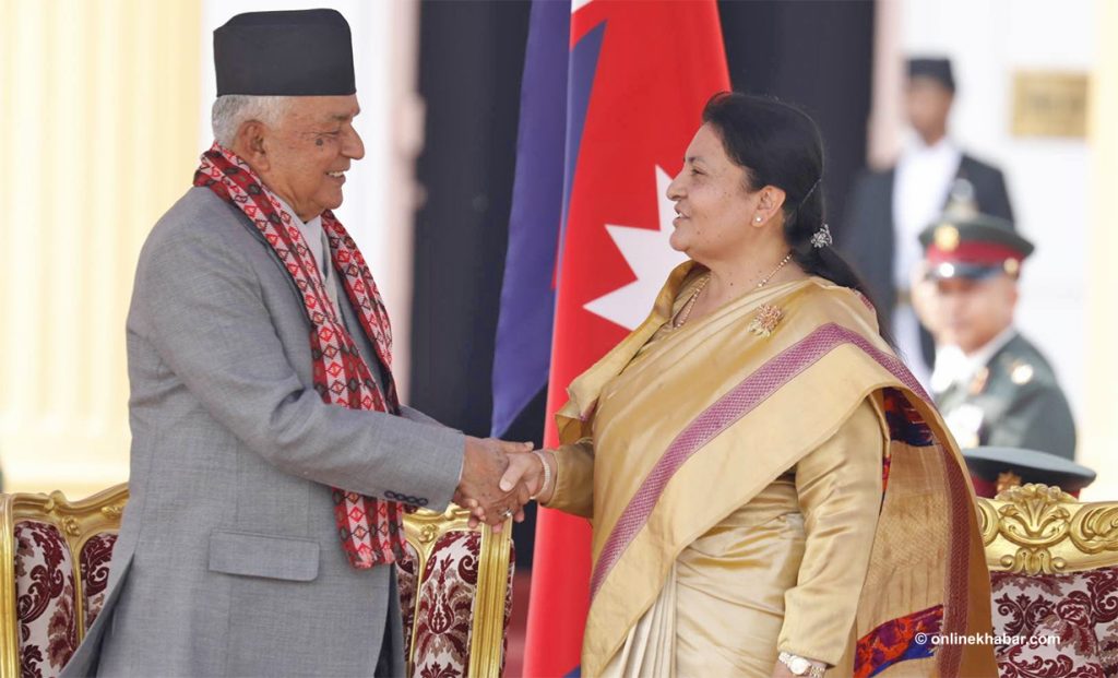 Newly elected President Ram Chandra Paudel shakes hand with outgoing President Bidya Devi Bhandari, in Kathmandu, on Monday, March 13, 2023. Photo: Bikash Shrestha