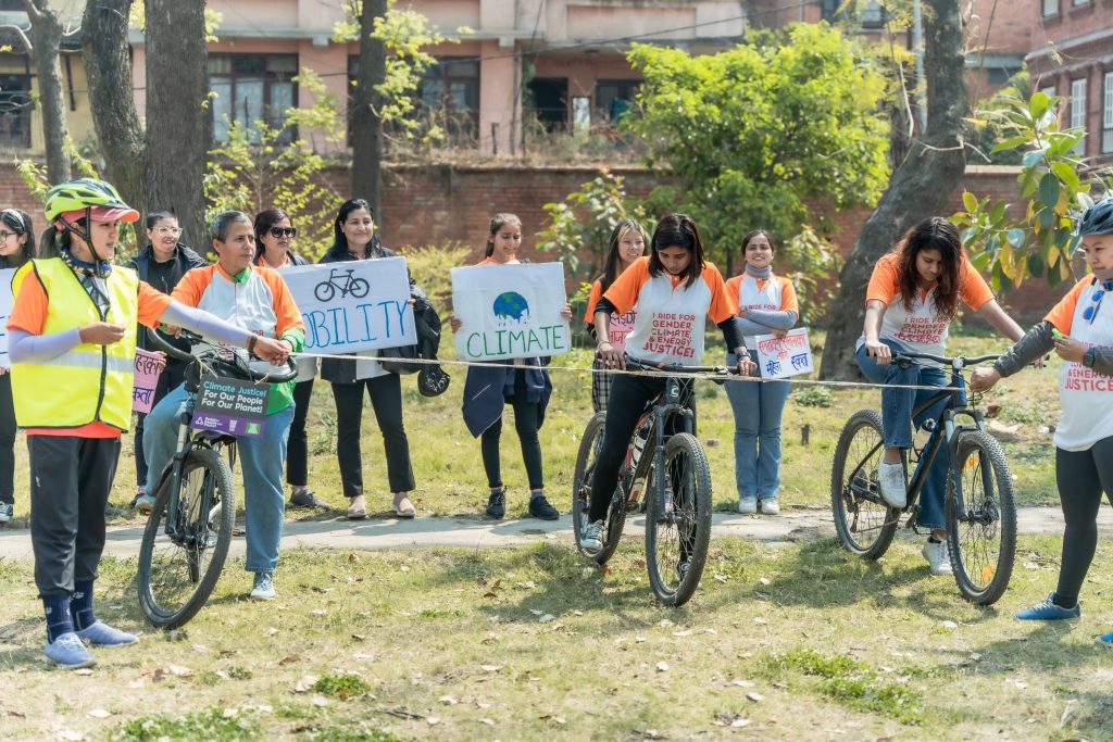 Women take out a slow cycle rally after a panel discussion on their mobility challenges, in Lalitpur, on Saturday, March 11, 2023. Photo: Digo Bikas Institute