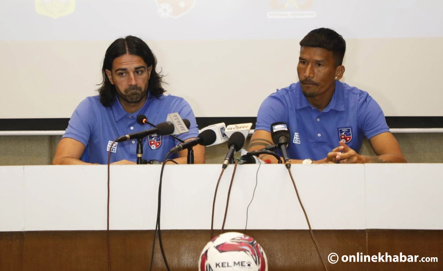 Nepal football coach Vincenzo Alberto Annese and captain Kiran Kumar Limbu speak at the pre-match conference of the Prime Minister Three Nations Cup, in Kathmandu, on Tuesday, March 21, 2023. Photo: Bikash Shrestha