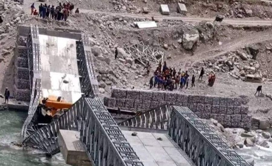 A Bailey bridge collapses over the Rapti river between the Jajarkot and Rukum West districts, on Thursday, April 20, 2023. 