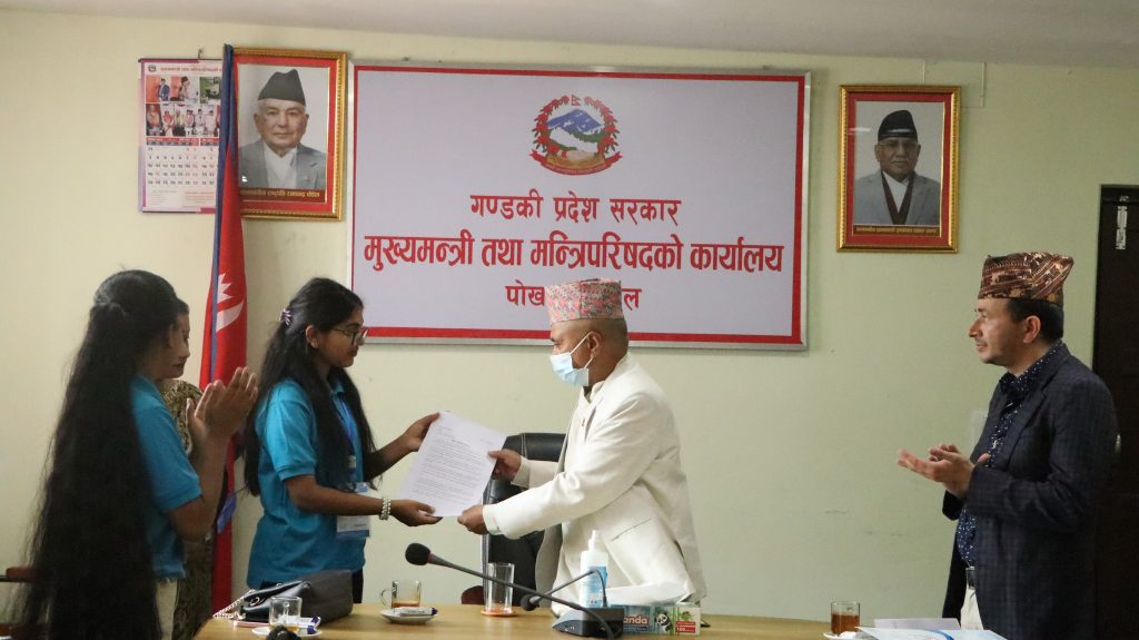 Gandaki Chief Minister Khaga Raj Adhikari received a memorandum from adolescent girls in Nawalpur, in Pokhara in April 2023. 