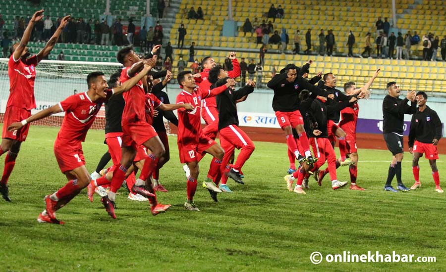 Nepal footballers celebrate with the fans after winning the Prime Minister's Three Nations Cup in March 2023. SAFF Championship 2023