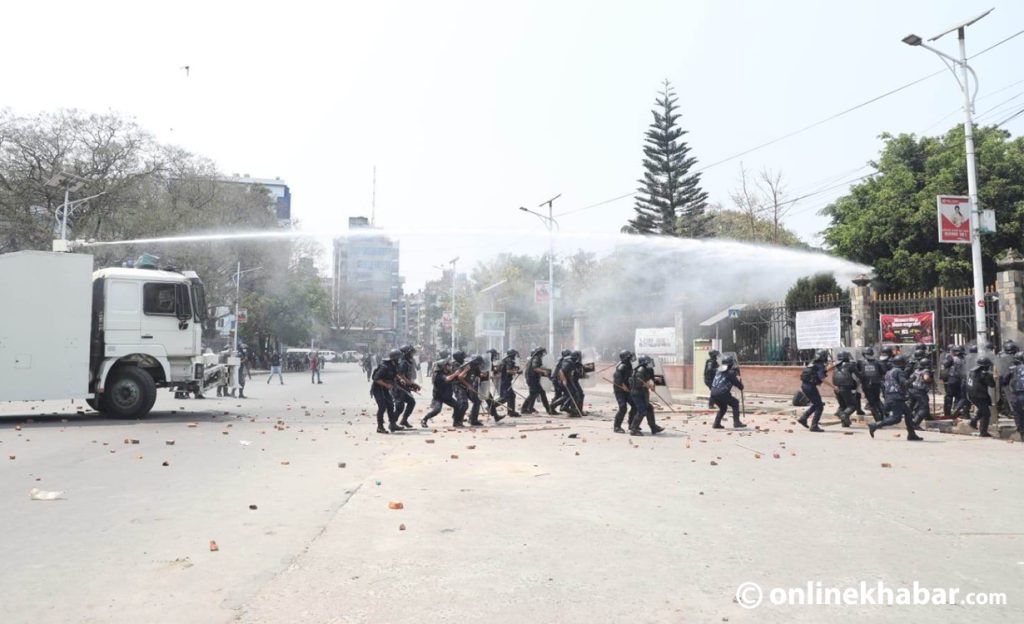 Police use water cannons to suppress a protest of meterbyaj victims at Ratna Park, Kathmandu, on Monday, April 17, 2023. Photo: Bikash Shrestha