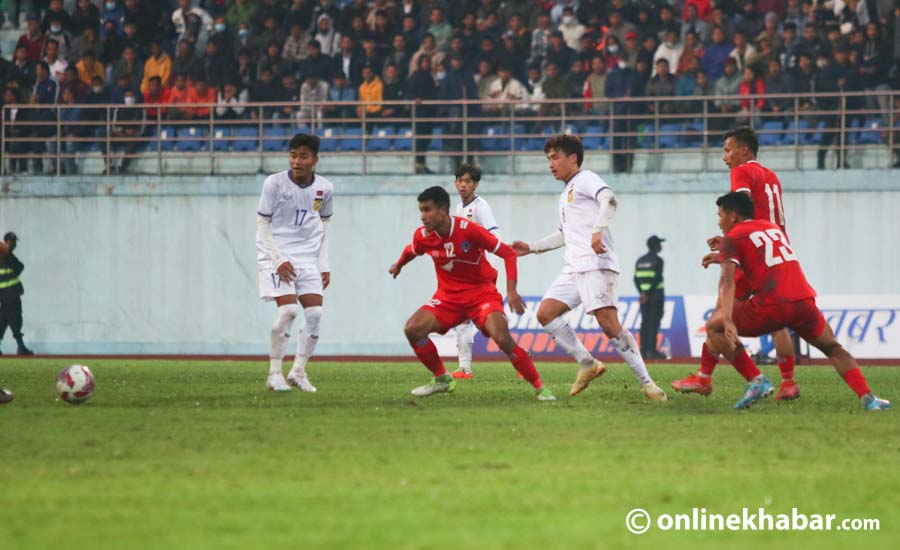 Nepal footballers struggled to keep the ball most of the time in their match against Laos during the Three Nations Cup in March 2023. Photo: Chandra Bahadur Ale