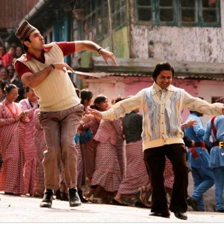 A screengrab from Barfi! L-R: Ranbir Kapoor and Bhola Raj Sapkota