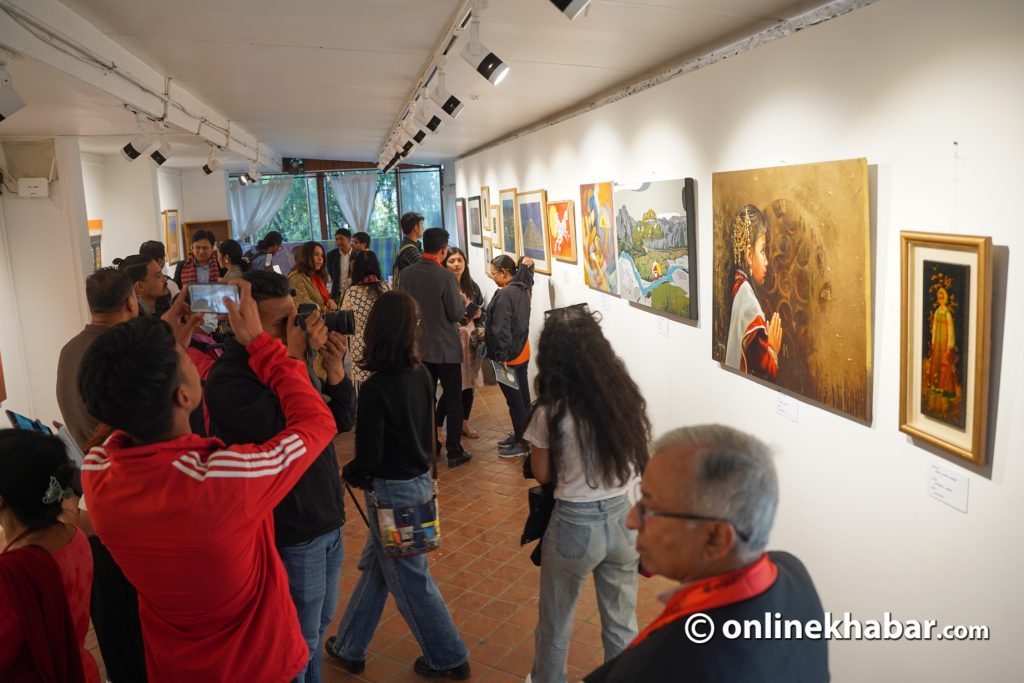 Visitors on the opening day of the exhibition, Under the Full Moon: The 3 Gen, at Windhorse Gallery, Jhamsikhel. Photo: Chandra Bahadur Ale