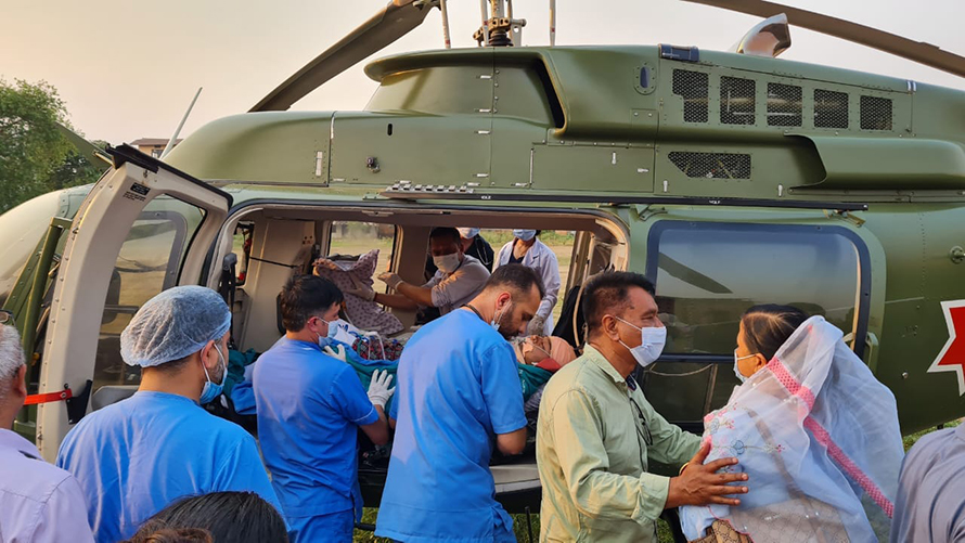Rastriya Swatantra Party president Rabi Lamichhane’s driver Dil Bahadur Thapa aka Shambhu is taken to Mediciti Hospital for treatment following an injury, in April 2023. 