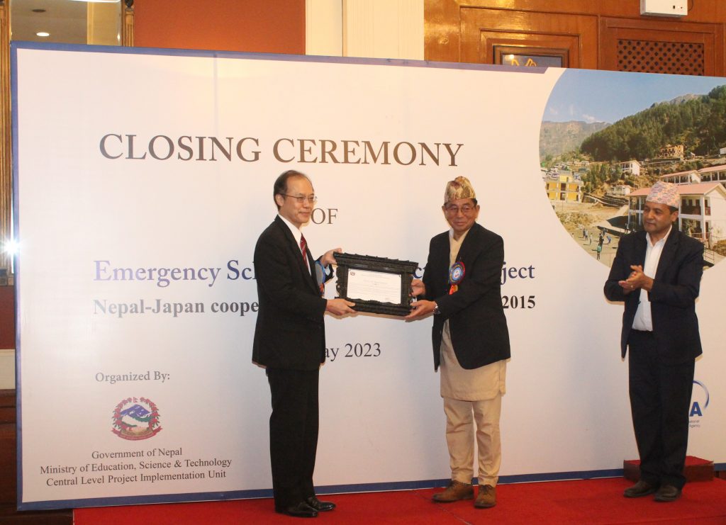 Education Minister Ashok Rai hands over a letter of appreciation to Japanese Ambassador Kikuta Yutaka for the Japanese support in rebuilding schools after the 2015 earthquake, in Kathmandu, on Wednesday, May 11, 2023. Photo: JICA
