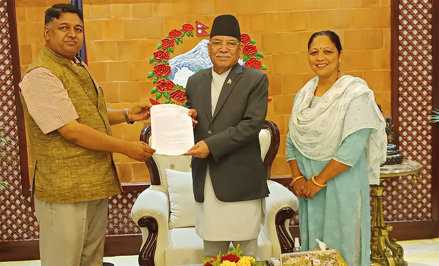 CPN-Maoist Centre leader Ram Kumar Sharma submits a memorandum to Prime Minister Pushpa Kamal Dahal asking him to hold a referendum to let the citizens choose between secularism and a Hindu state, in Kathmandu, on Tuesday, May 16, 2023. 