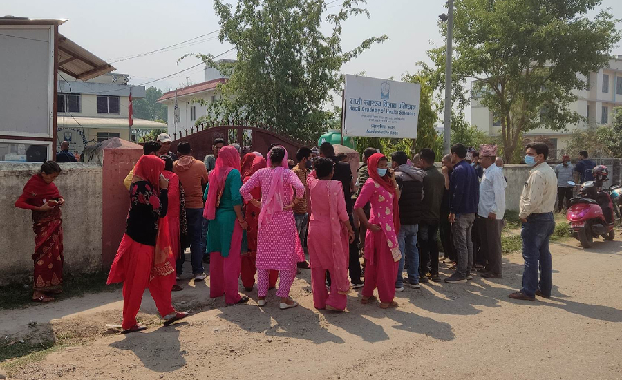 Locals stage a protest outside the Rapti Academy of Health Sciences, in Dang, on Friday, May 12, 2023. 