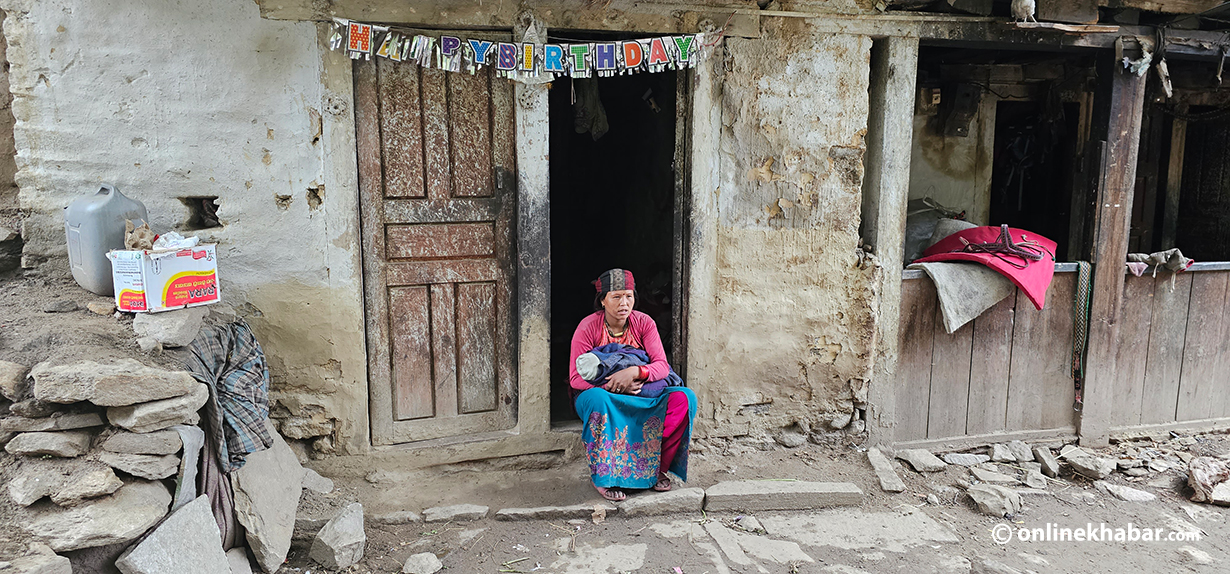 Ramila Gurung with her child at her house.