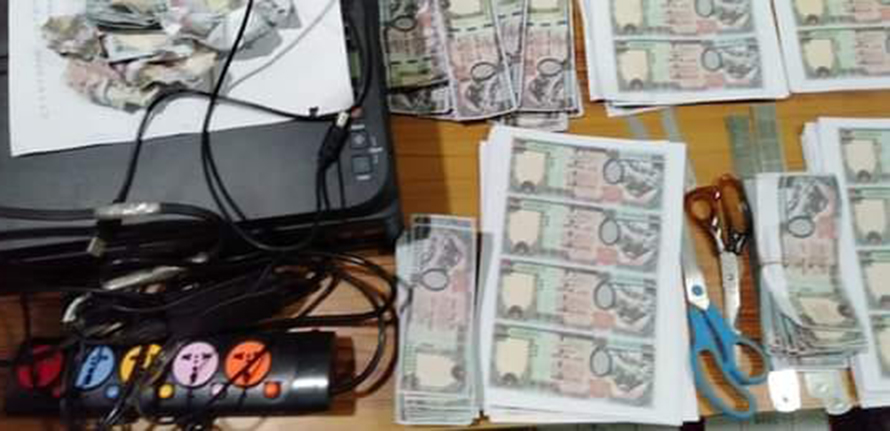 Police arrest 9 on charges of printing fake currency