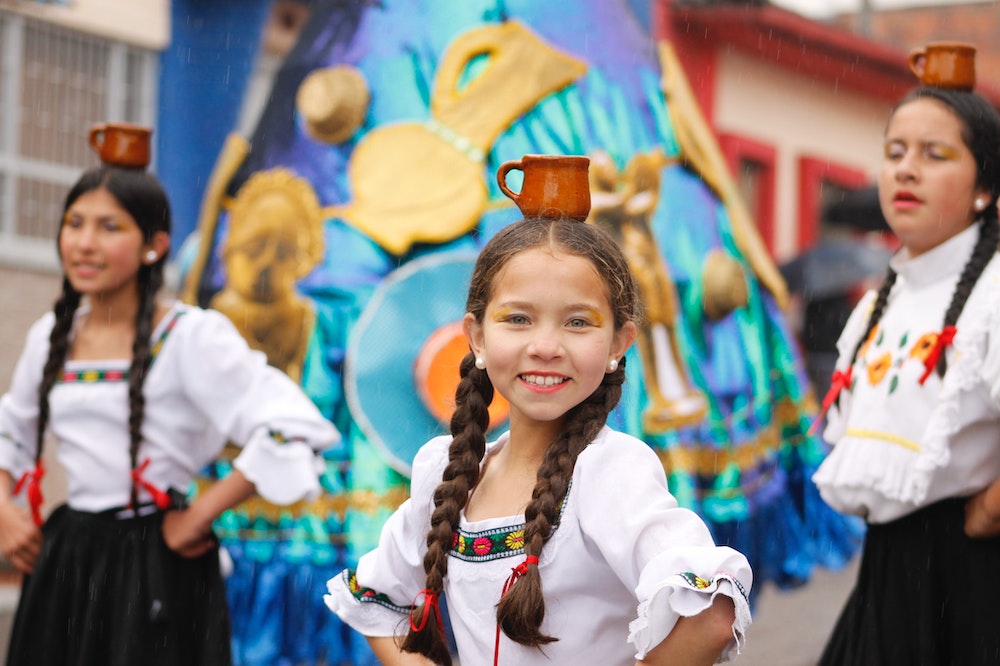 Girl dancing at Zipaquirá, Cundinamarca, in Colombia. Photo: Pexels/ Cristhian Cabra