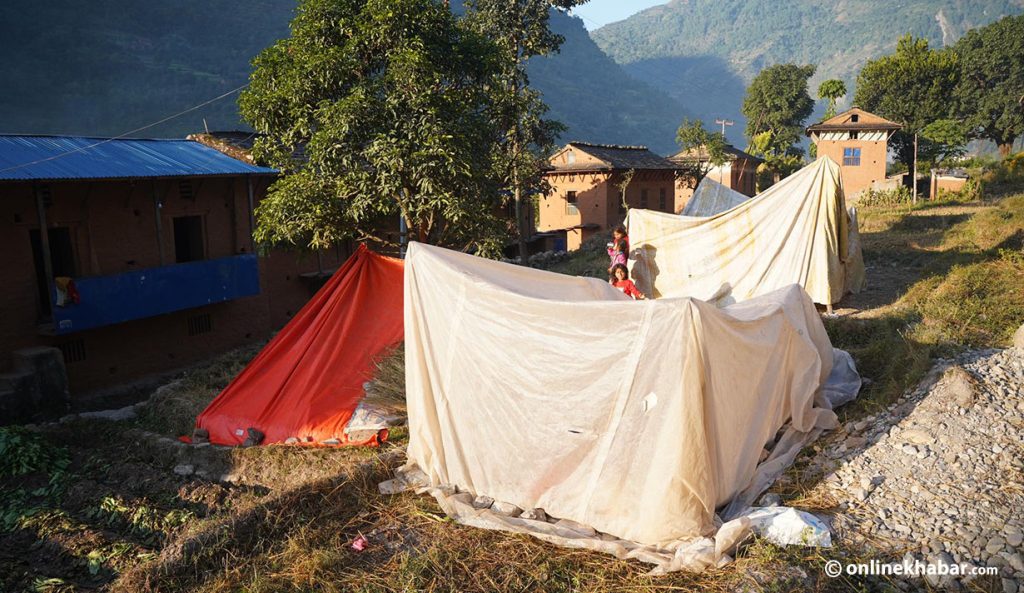 Earthquake survivors in Nalgad take turns to sleep in makeshift shelters for night’s respite