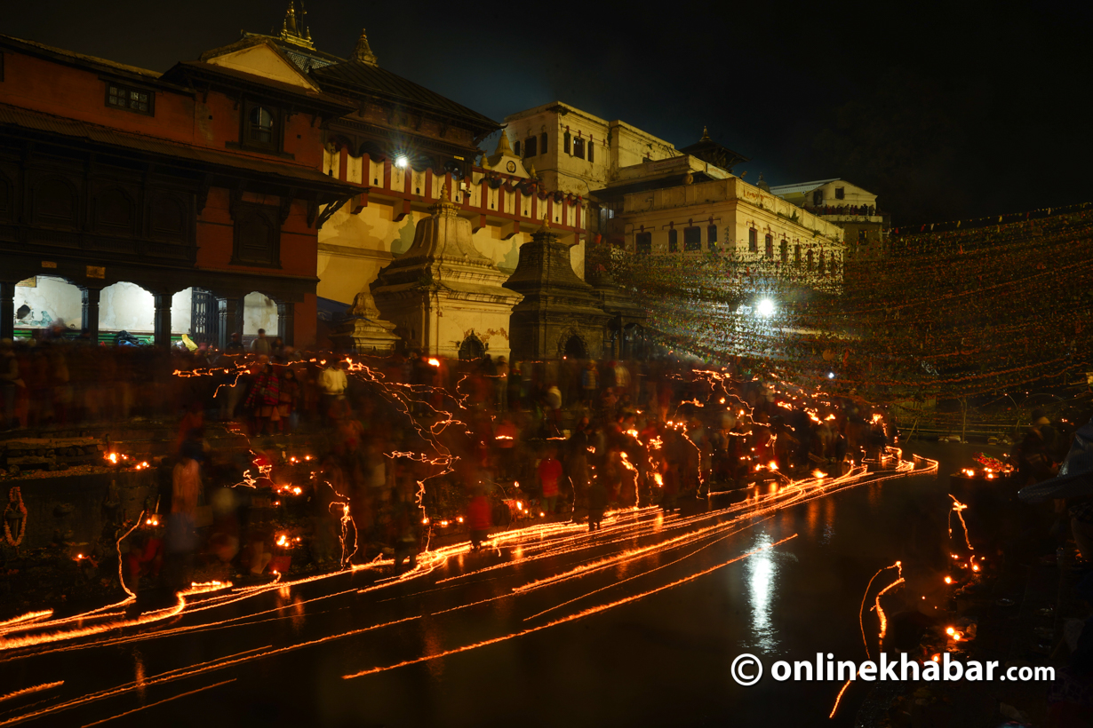 People pay homage to departed family members during Balachaturdashi at Pashupatinath Temple