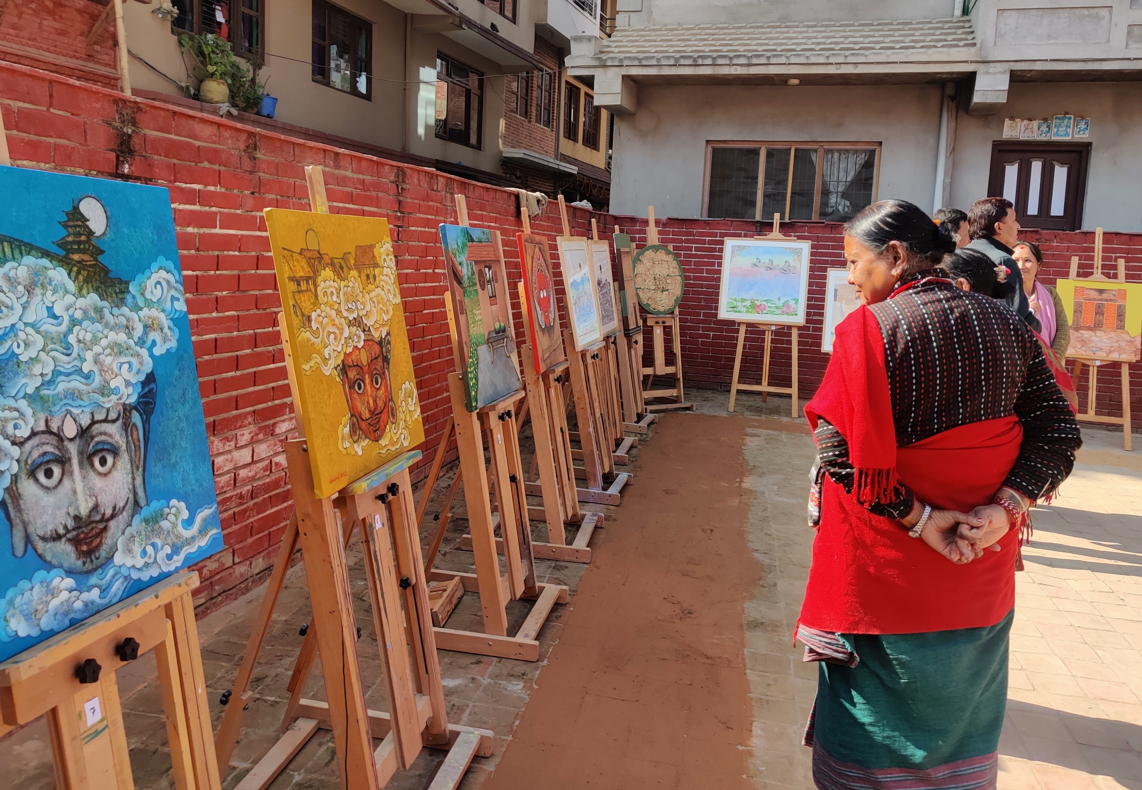 Visitors observing the artworks showcasing the Newa culture in exhibition at Harisiddhi Art Mela, held on Tuesday, January 2. Photo: Nasana Bajracharya
