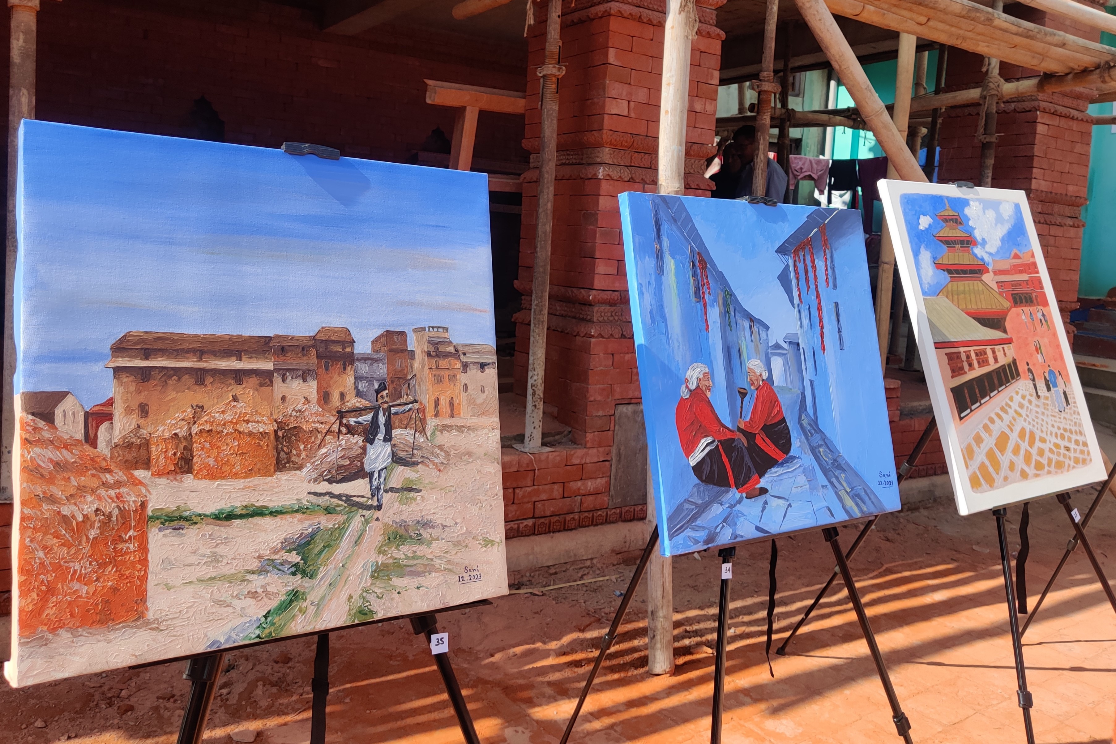 Artworks showcasing the Newa culture and older Newa settlements in an exhibition at Harisiddhi Art Mela, held on Tuesday, January 2. Photo: Nasana Bajracharya