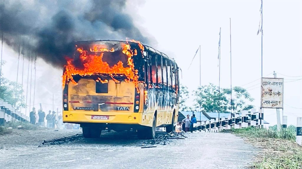 Unidentified group sets school bus ablaze in Chitwan