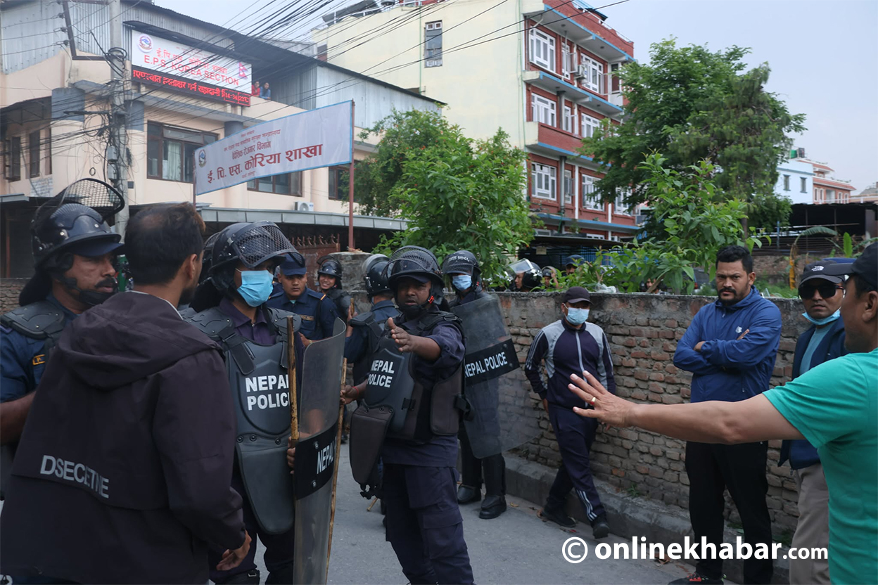 Police use batons on youths protesting at EPS Korea Office in Lalitpur