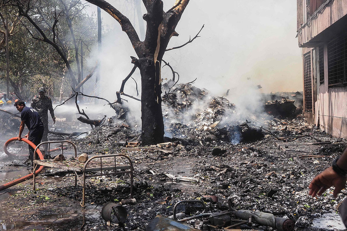 Indian security officials continue search operation on second day of Air India crash (Photos)