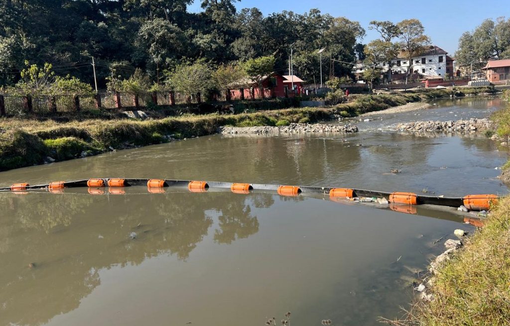 Trash barriers installed in Bagmati River to collect floating waste