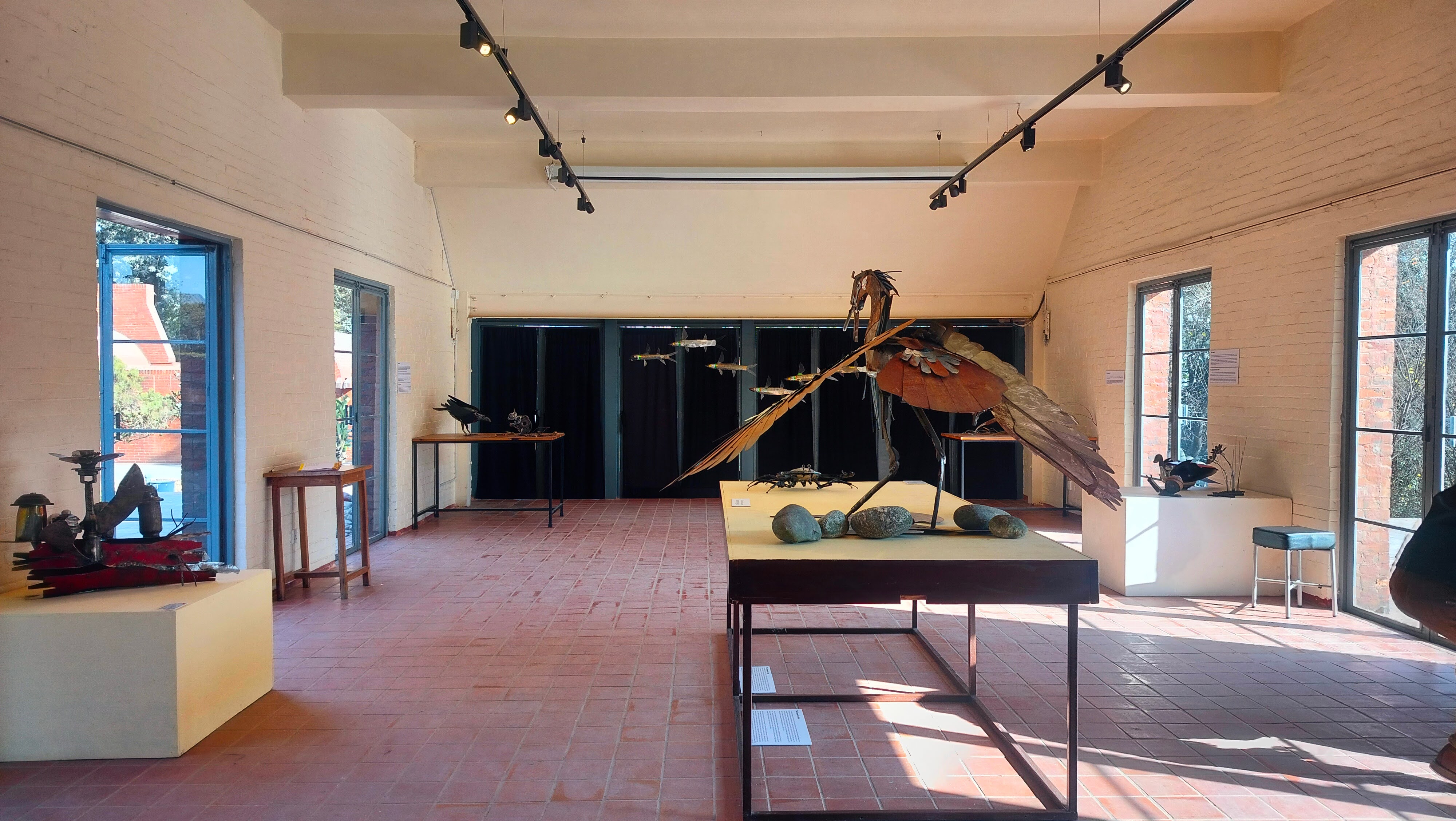 The huge metal haron spreading its wings, which seems to be in a position to attack at the exhibition Metamorphosis.