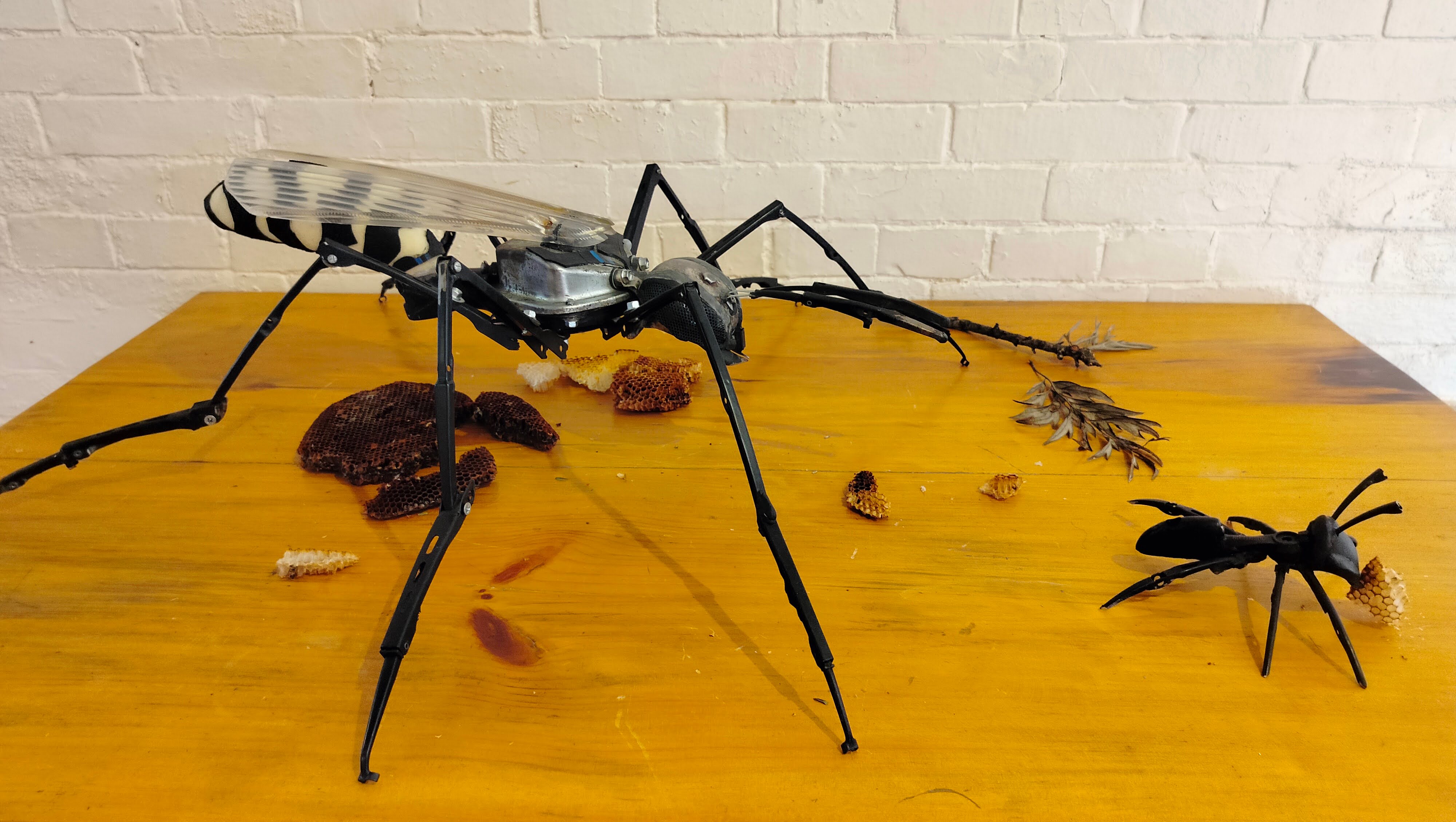 The sculpture of wasp and ant at the exhibition Metamorphosis.