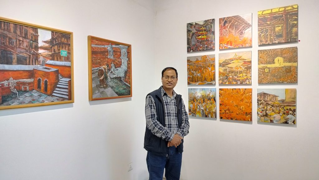 Artist Pradip Kumar Bajracharya at the exhibition 'Festive Spirit' at MCube Gallery .