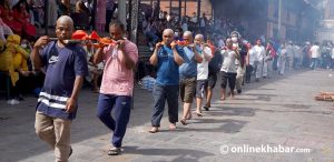 Families hold mass cremations for missing Rasuwa flood victims (Photos)