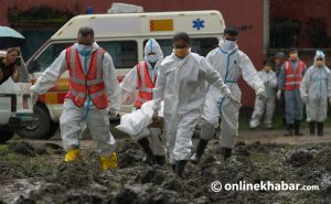 Unidentified flood victims’ bodies being buried in Kathmandu