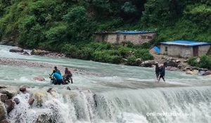 Locals risk lives crossing Taksugad after flood washes away bridge