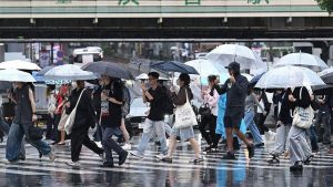 Typhoon disrupts flights, transport and Asian Games in Japan