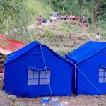 Flood-displaced families in Nuwakot’s Betrawati shelter in forest tents